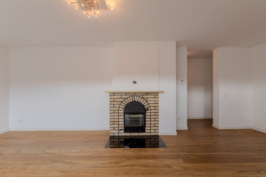 Wohnzimmer mit Kamin Erdgeschosswohnung Heidelberg
